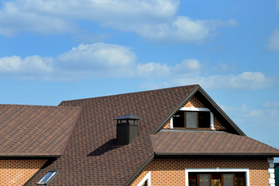 Home with brown roof. Legit Exteriors provides expert roof certifications in Portland OR and Vancouver WA.